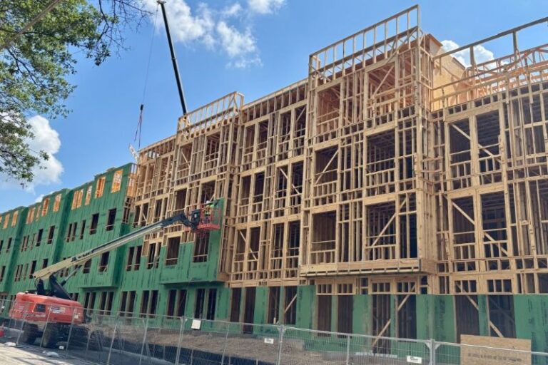 Multifamily building with wood framed balconies